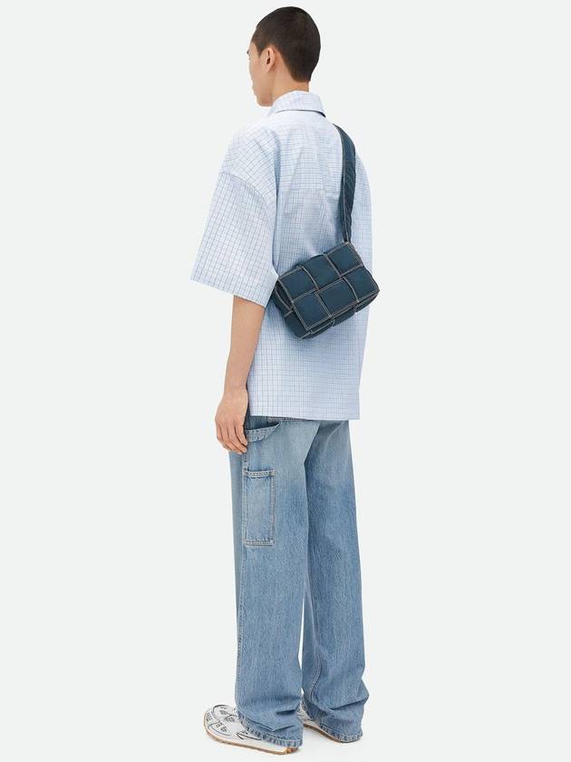 Bottega Veneta Small padded tech cassette crossbody bag deep blue white