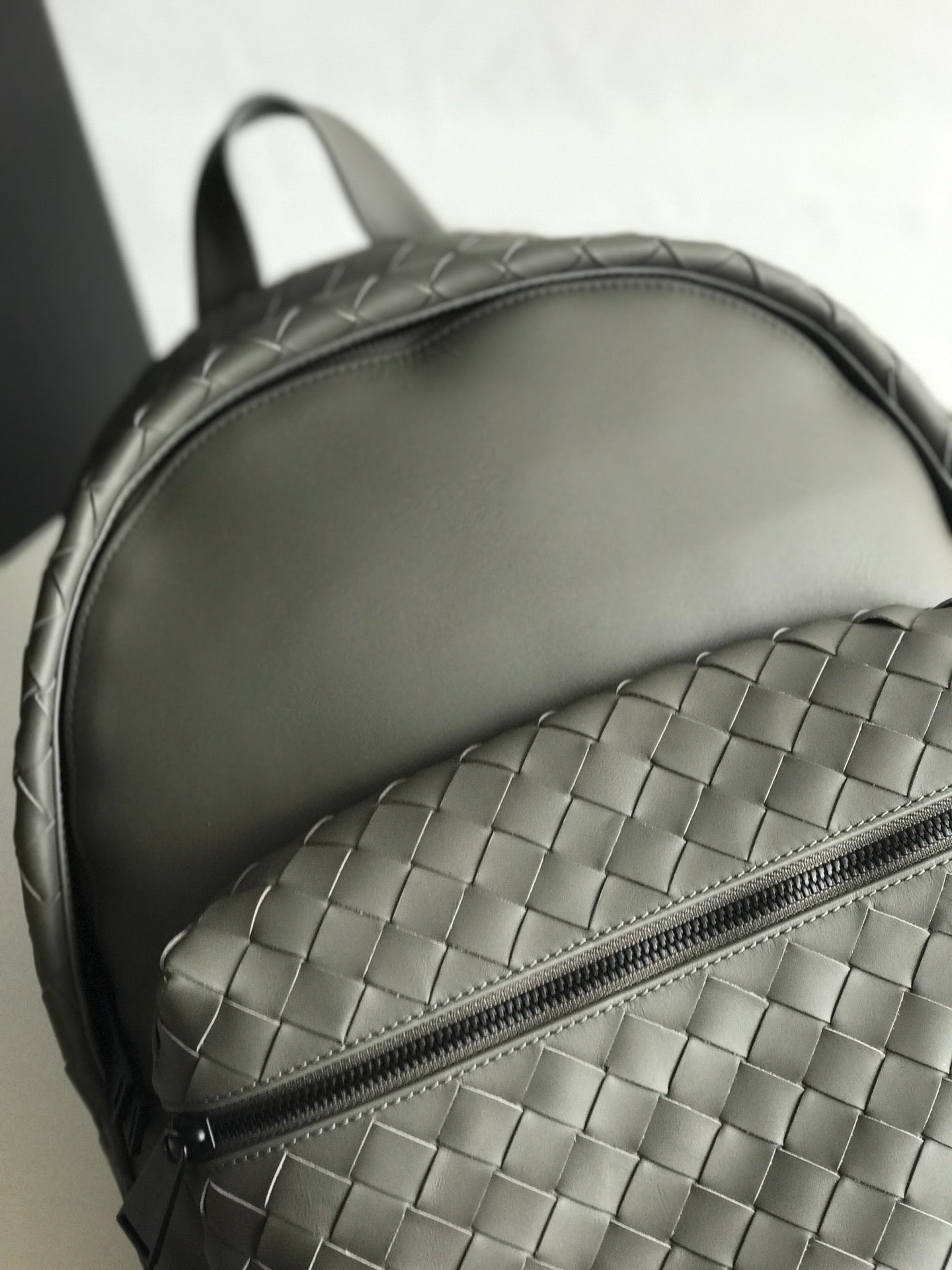 Bottega Veneta SMALL INTRECCIATO 41 BACKPACK IN CHARCOAL BLACK CALFSKIN
