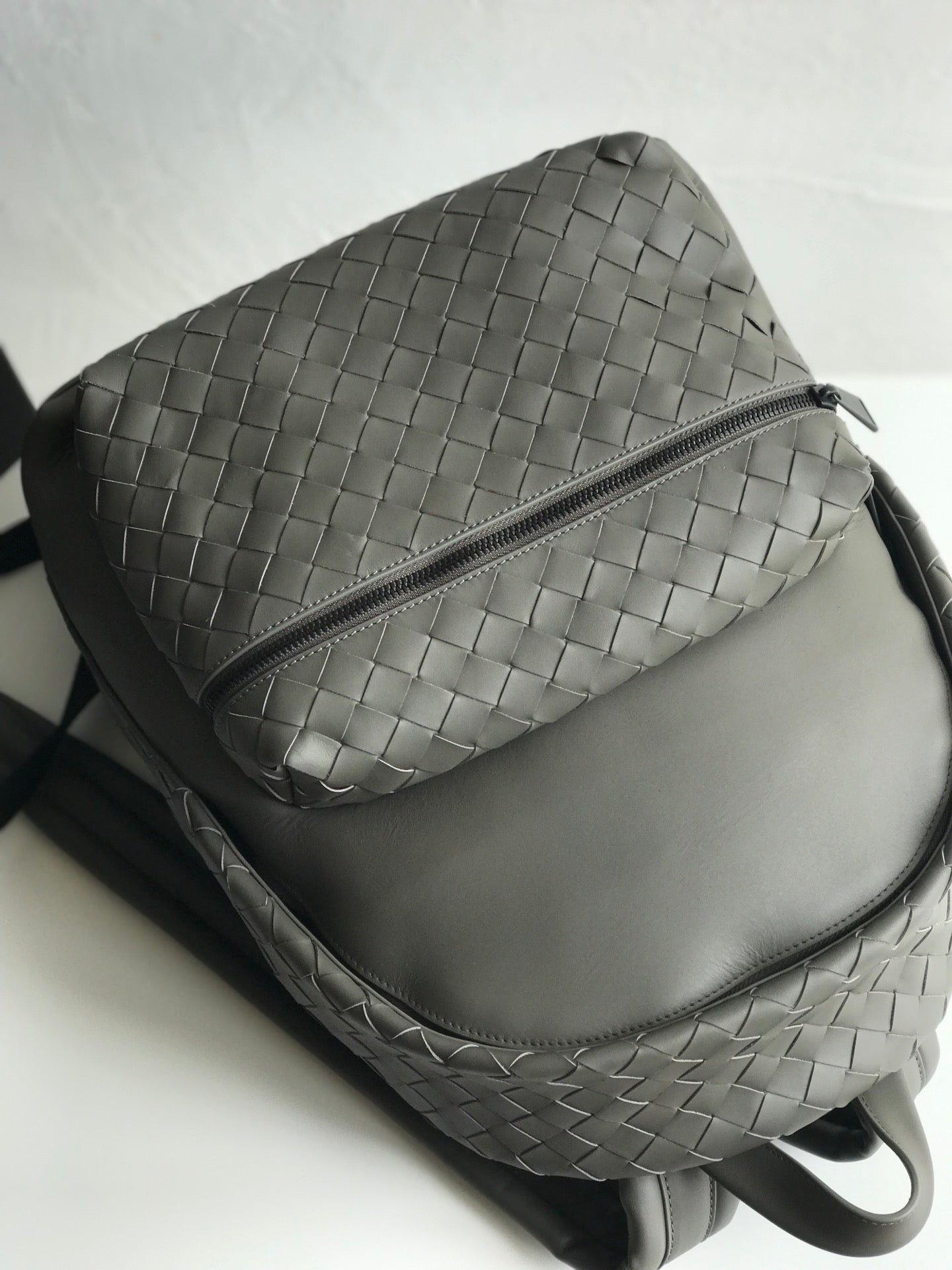 Bottega Veneta SMALL INTRECCIATO 41 BACKPACK IN CHARCOAL BLACK CALFSKIN