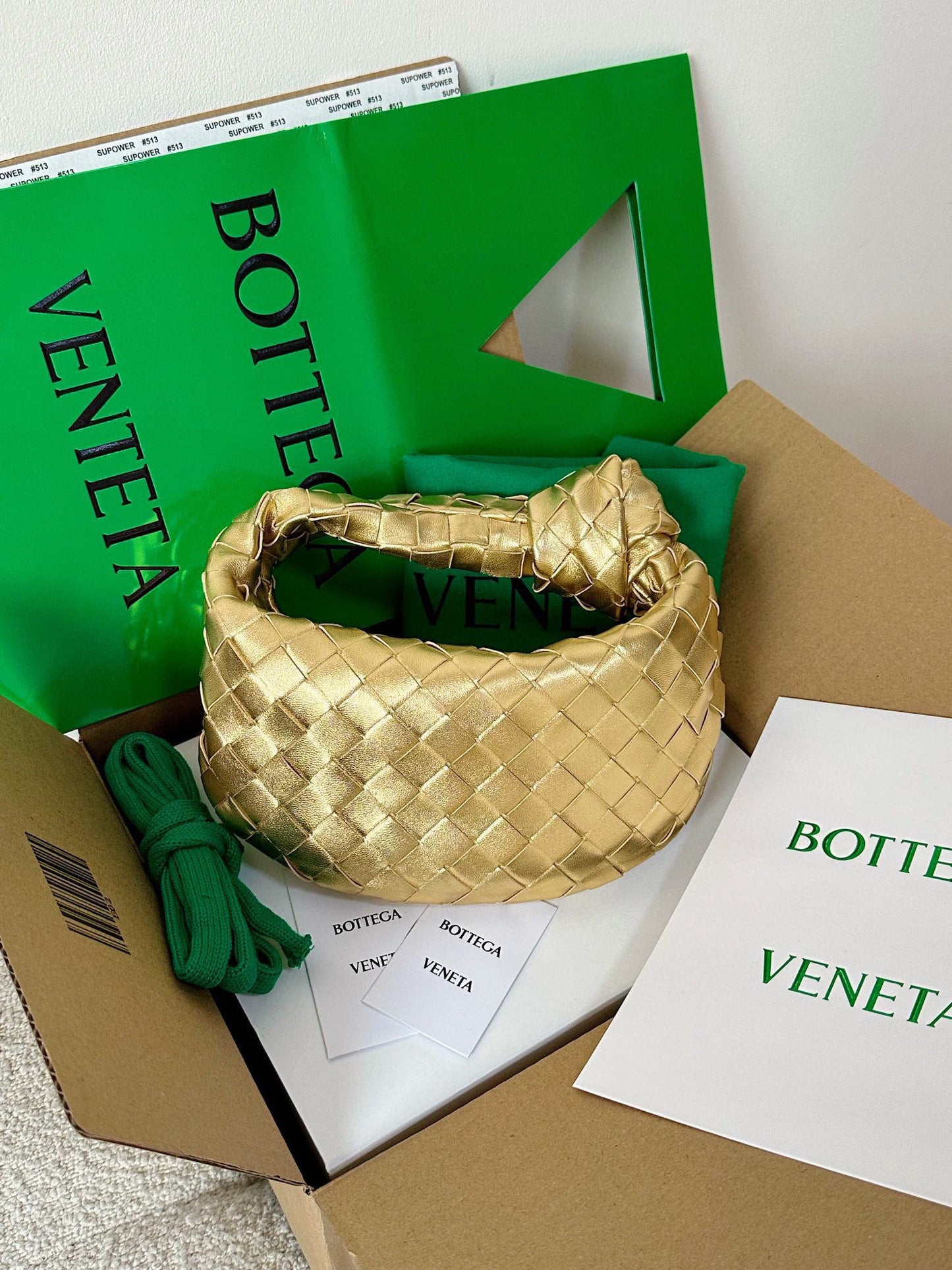 Bottega Veneta mini jodie 28 gold metalic lambskin