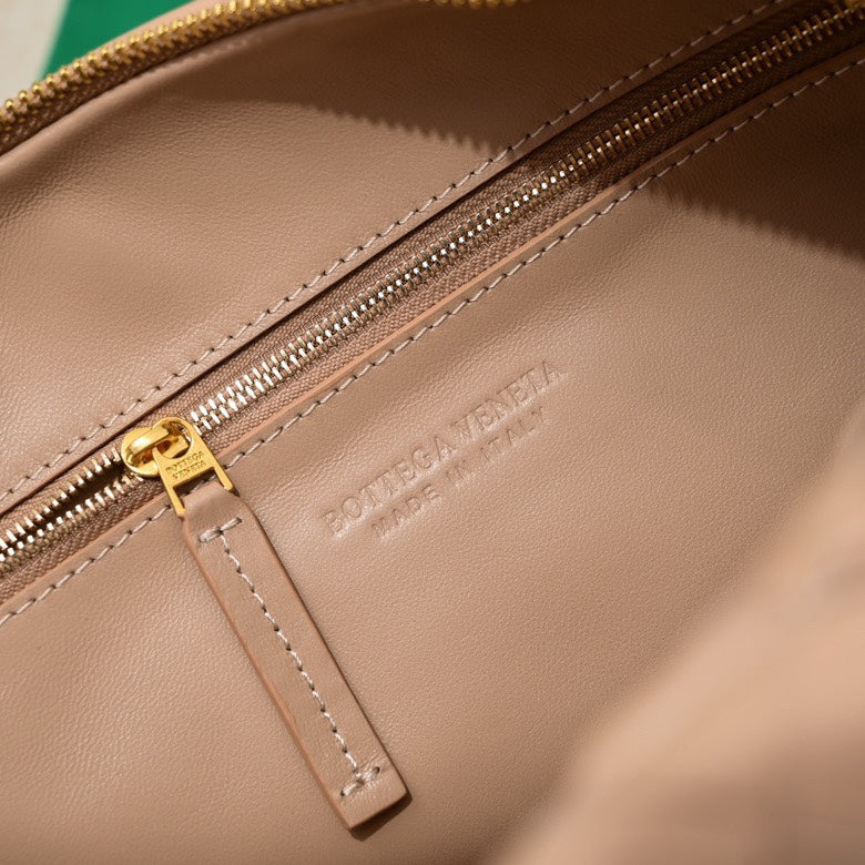 Bottega Veneta small jodie 48 pinkish beige lambskin