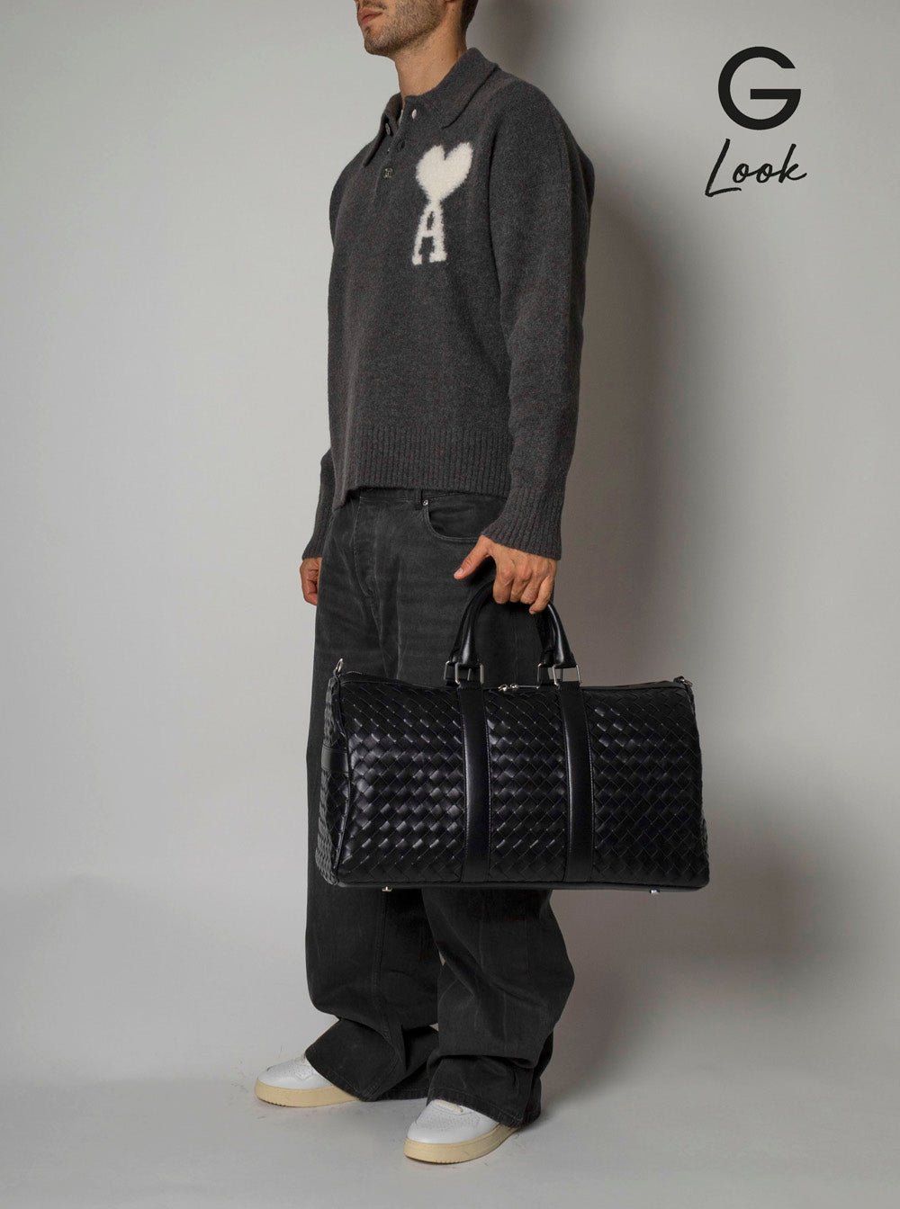 Bottega Veneta Men Black Travel Bag With Intrecciato Motif And Shoulder Strap In Leather Man