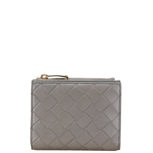 Bottega Veneta Leather Maxi Intrecciato Bifold Wallet