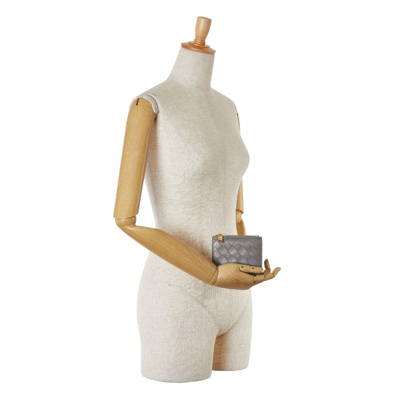 Bottega Veneta Leather Maxi Intrecciato Bifold Wallet