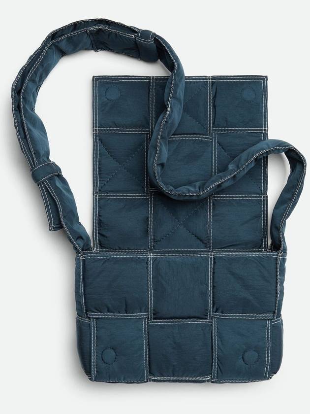 Bottega Veneta Small padded tech cassette crossbody bag deep blue white
